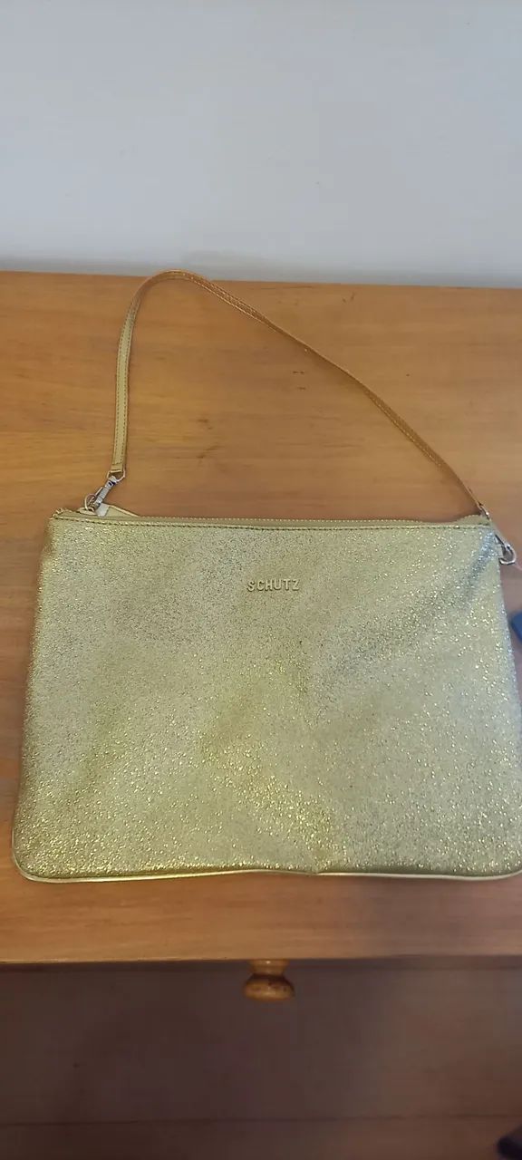 Bolsa schutz dourada