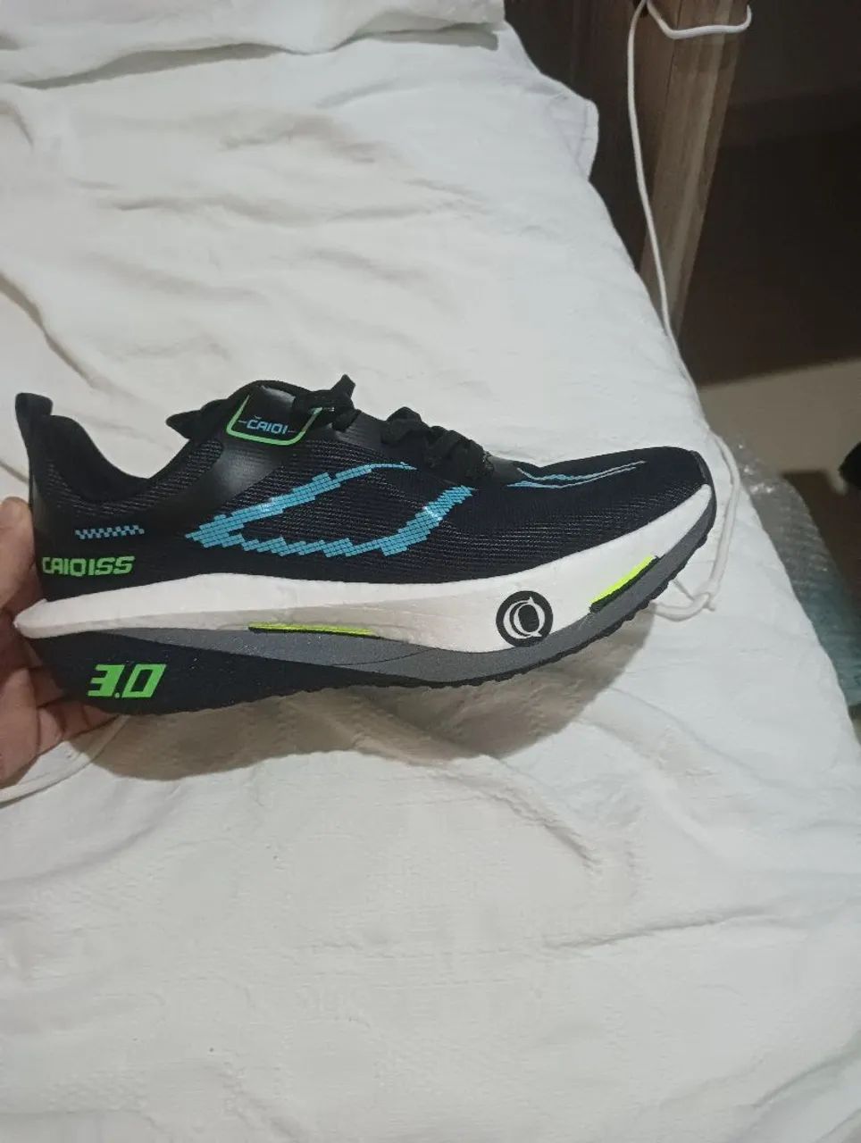 Tênis de corrida com placa de carbono