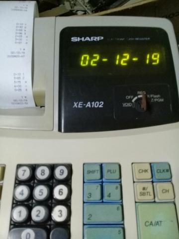 Registradora sharp xea 102