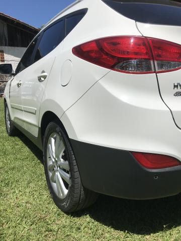 Hyundai IX 35 2015 branca Flex Aut. IMPECAVEL - Foto 8