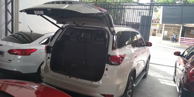 Vendo uma linda nova toyota sw4 srx diesel 4x4 7l top 5km 2018/2018 - Foto 5