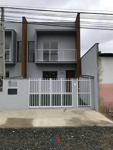 Sobrado Geminado em Rua Asfaltada no Bairro Itaum - Foto 2