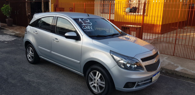 Vendo ou troco Agile 1.4 LTZ , ano 2013 , com GNV.