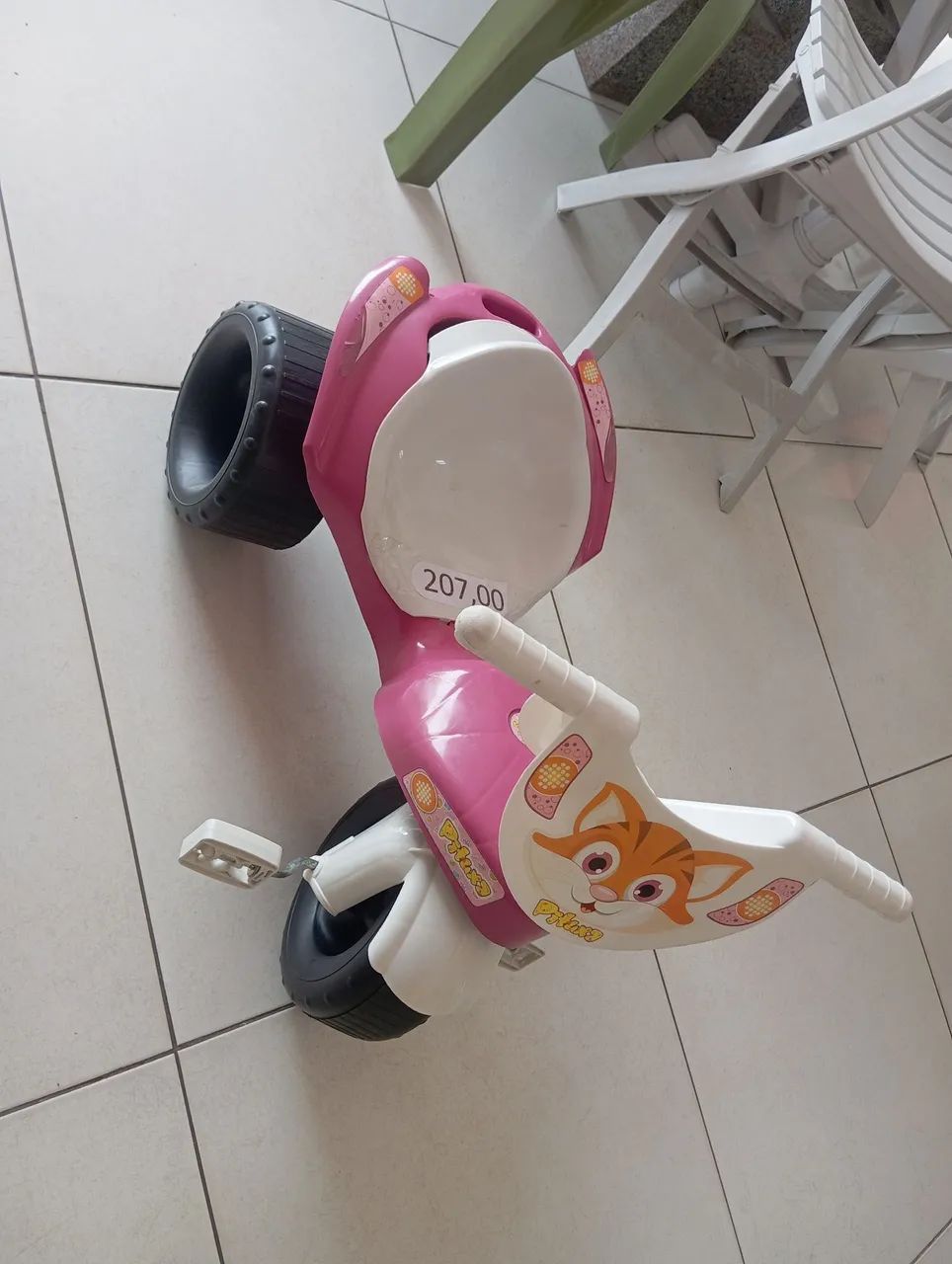 Triciclo rosa da Pituxa