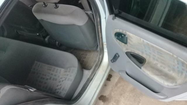 Vendo ou troco pego uno gol corsa carro no msm valor - Foto 4