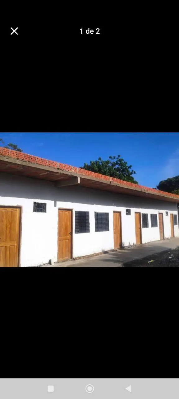 Vendo terreno com 4 kitnets