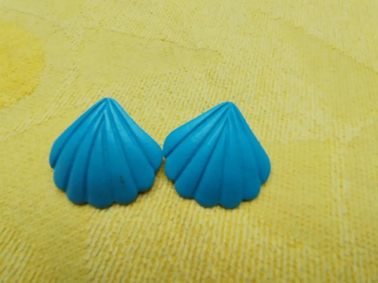 Brinco azul de concha