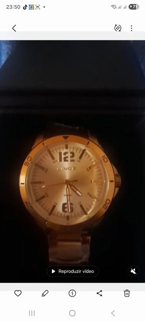 Vendo relógio dourado 
