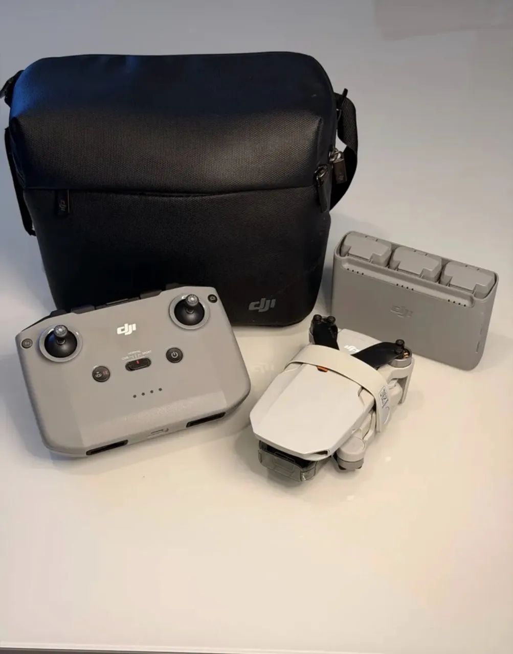 Drone Dji Mini 2 Fly More Combo 3 Baterias com Kit Fly More Cinza - Foto 3