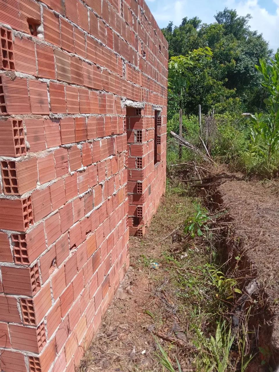 Terreno com casa