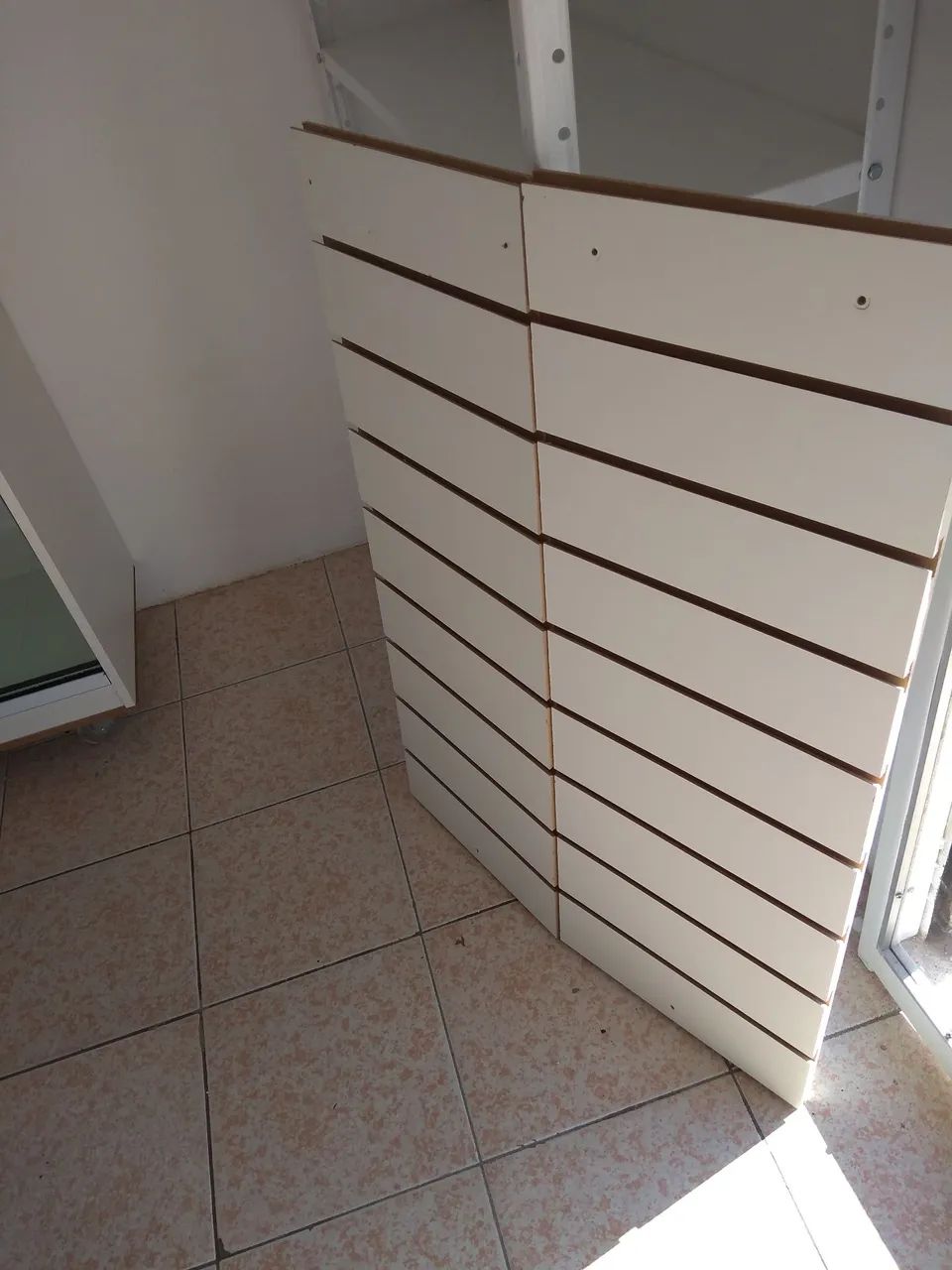 Painel expositor e ganchos