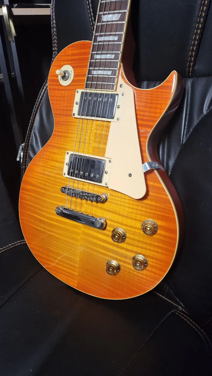 Guitarra Les Paul Vintage Modelo V100 (thrue honey bursti). Aceito trocas em IPhone.