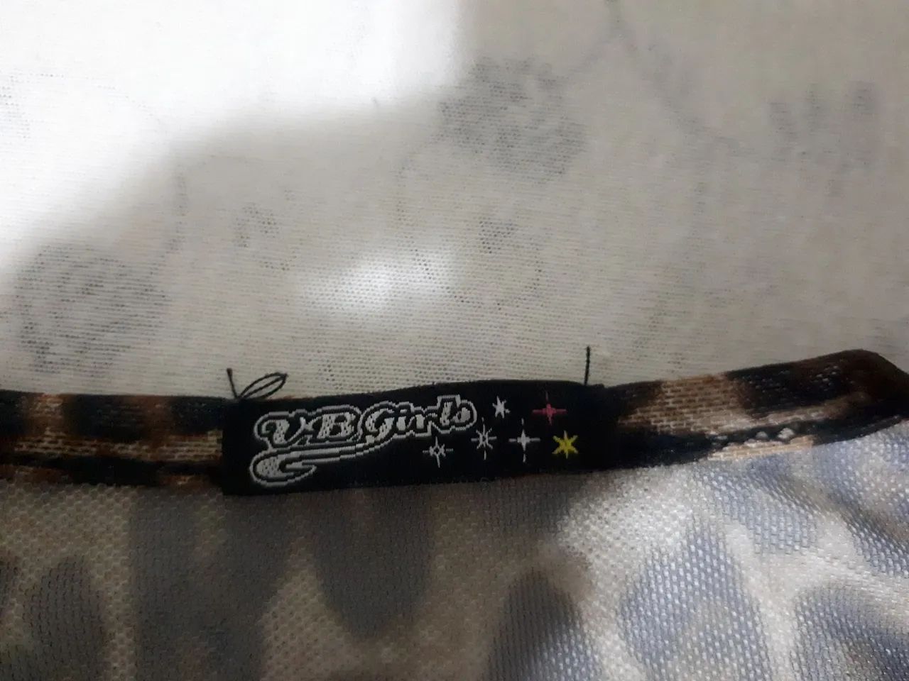 Blusa manga longa onça transparente com top preto  - Foto 2