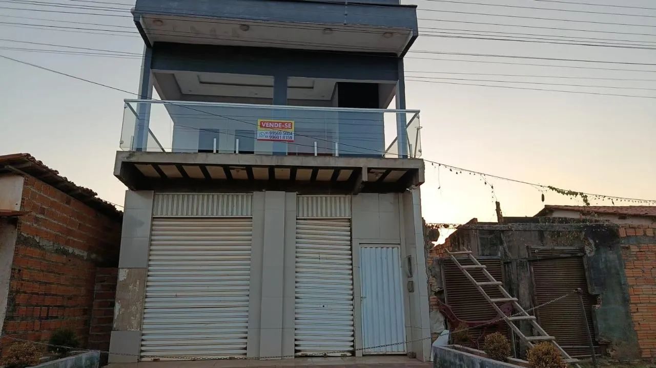 Casa e ponto comercial  T *