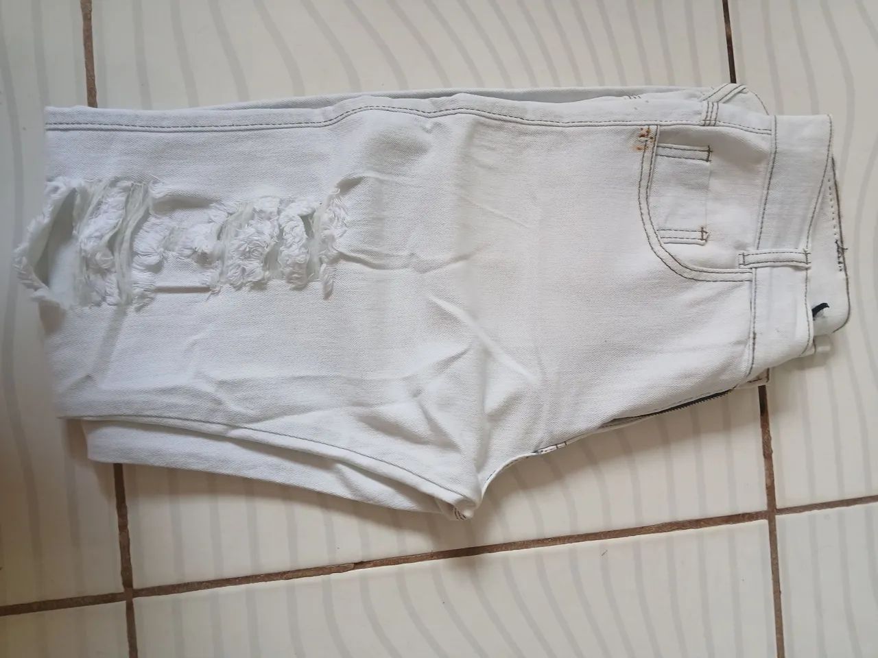 Calça rasgada  - Foto 3