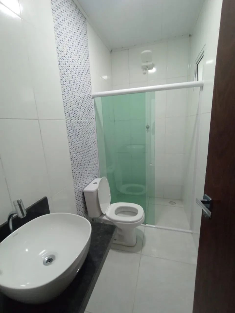 CASA COM TRÊS QUARTOS - SENDO DOIS SUITES - Foto 5