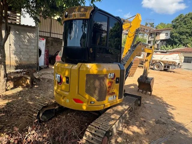Mini Esvacadeira Caterpillar ano 2022 303,5 3.000 horas - Foto 5