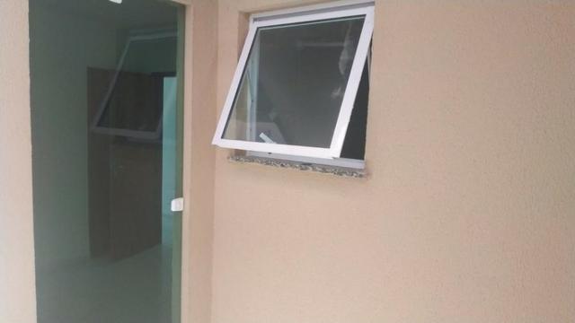 Casa com 2 quartos, 2 banheiros, varanda, sala de estar. - Foto 10