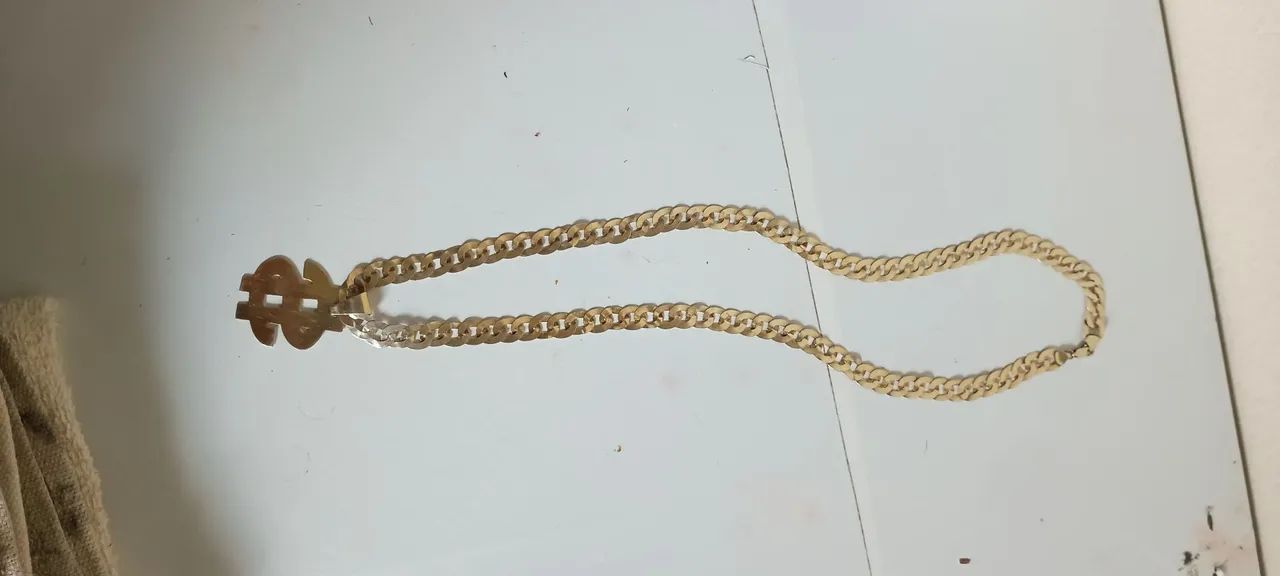 Cordão de prata banhado a ouro com Pingente de Dólar