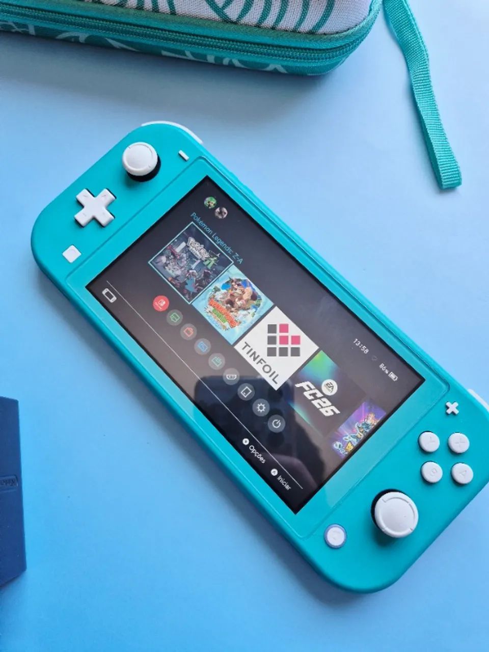 Nintendo Switch Lite Azul Turquesa 128GB Cheio de Jogos + Estojo