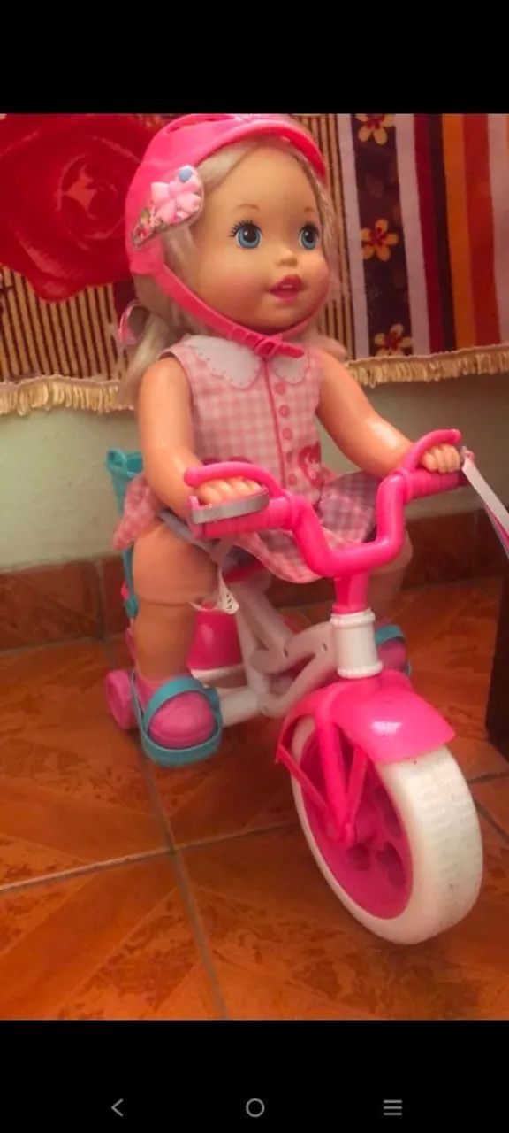 Boneca litlle momy com bicicleta 