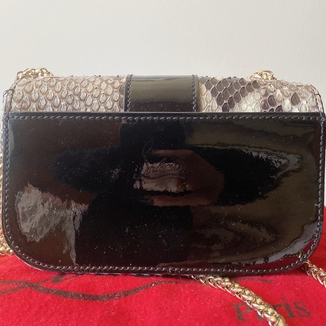louboutin dust bolsa