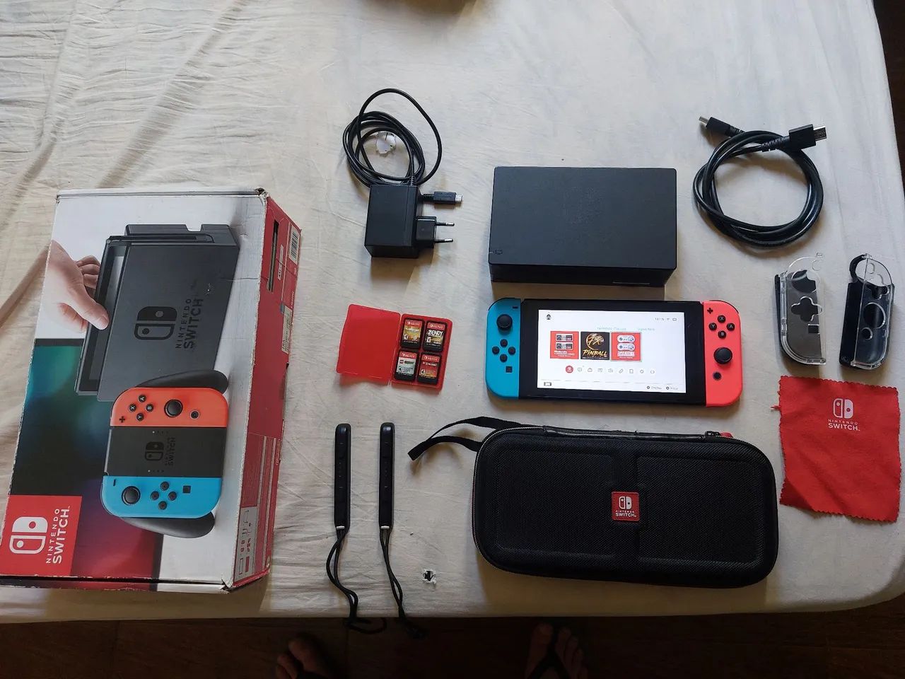 Vendo nintendo switch original com 4 jogos - Foto 4