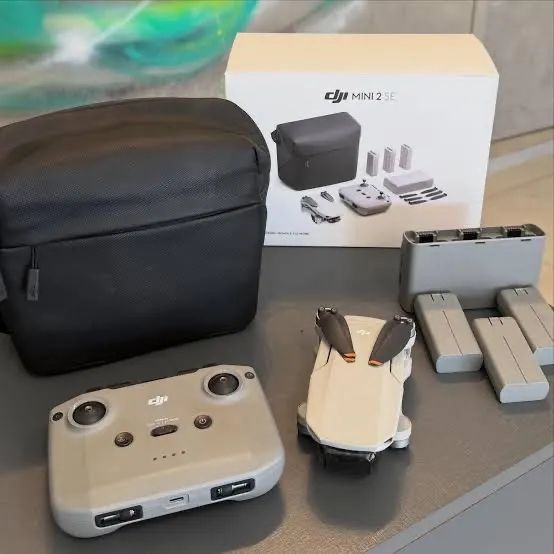 Drone DJI Mini 2 SE + Fly More combo + cartão de memória 256GB  - Foto 2