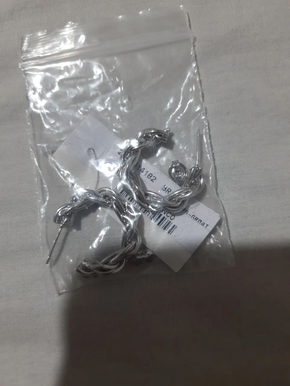 Vende-se Brinco de argola entrelaçada da Morana