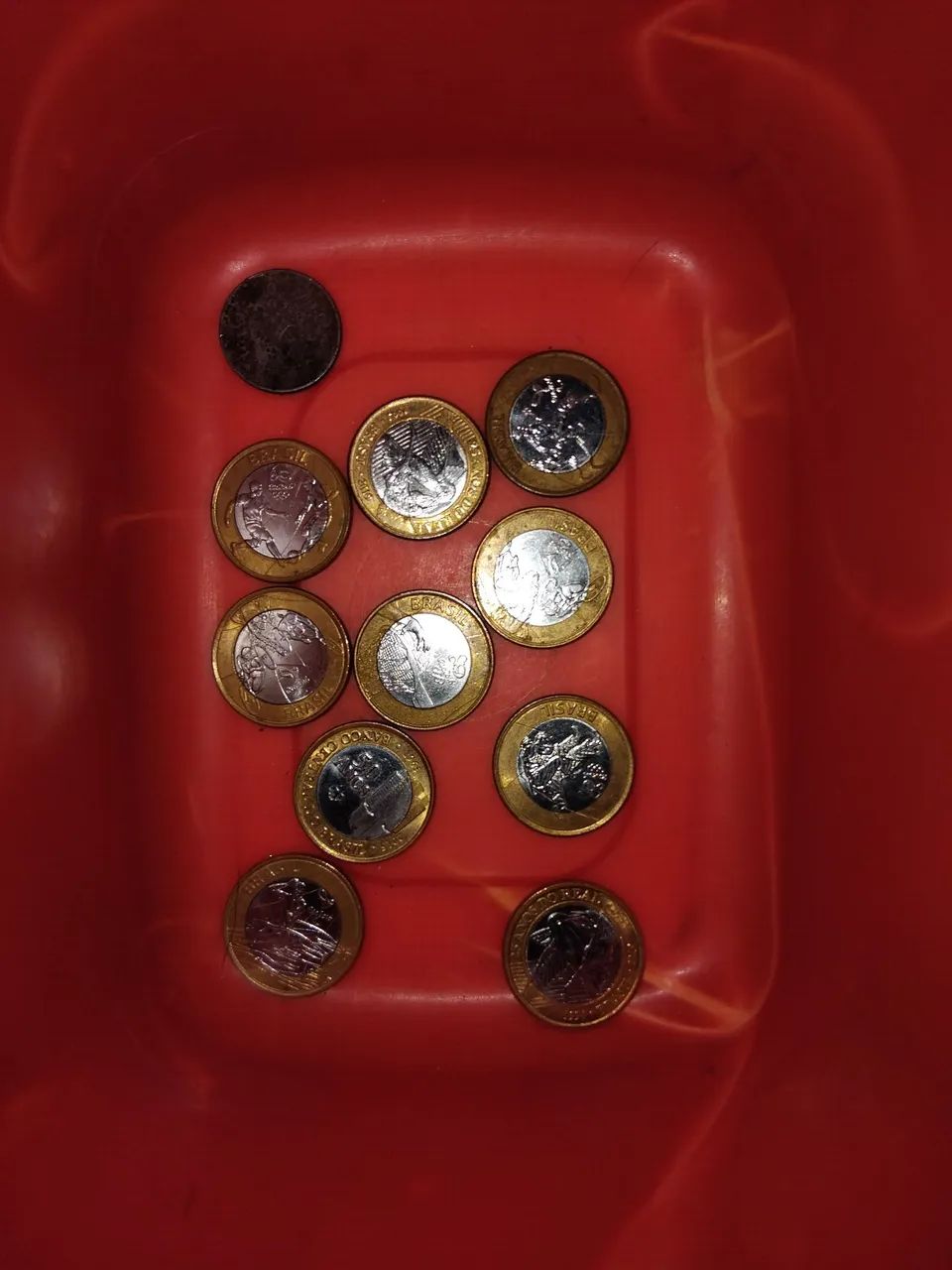 Coleção de moedas e cédulas raras.