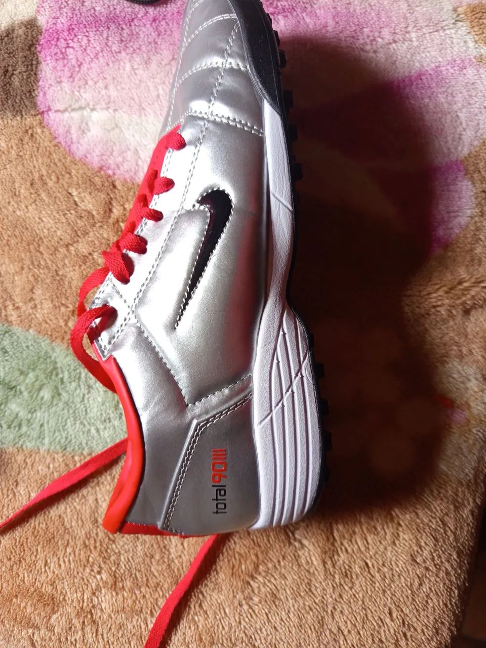 Chuteira Nike total 90 