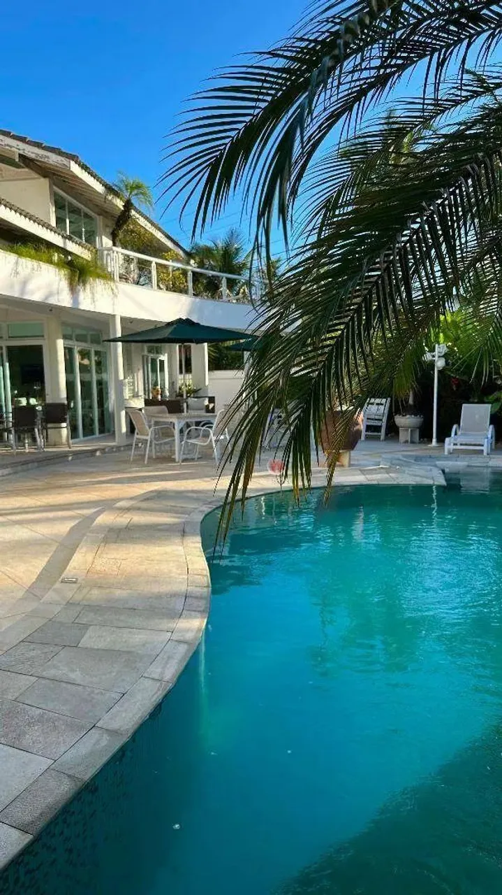 Sobrado com 4 dormitórios à venda, 340 m² por R$ 3.100.000,00 - Praia da Enseada - Guarujá