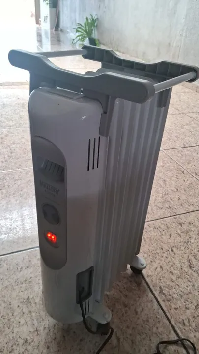 Aquecedor de Ambiente Elétrico a Óleo .