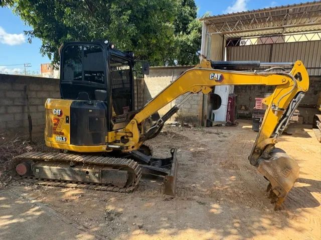 Mini Esvacadeira Caterpillar ano 2022 303,5 3.000 horas - Foto 4