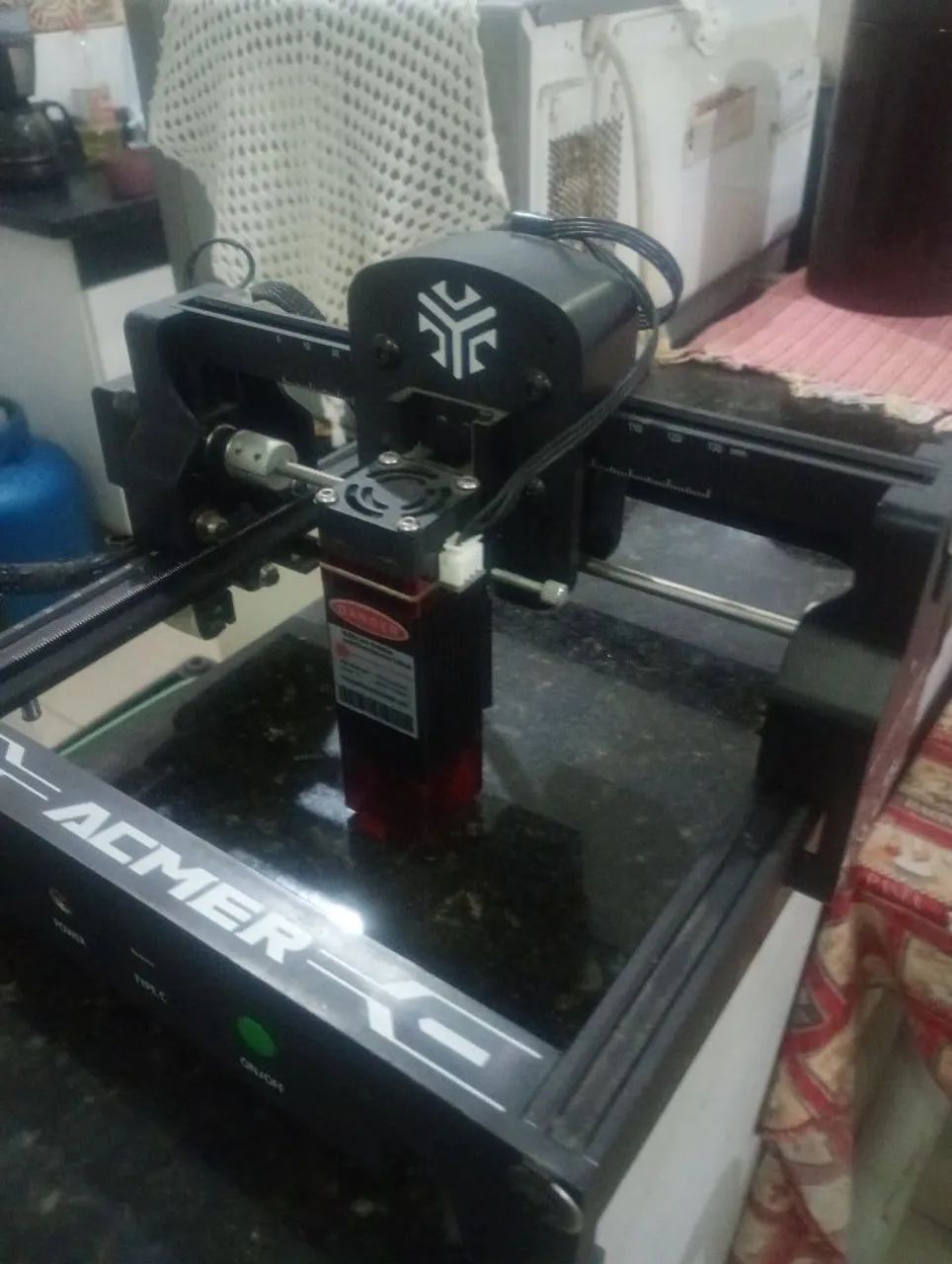 Máquina a lazer 