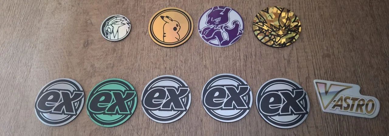 Moedas pokemon variadas! CHEQUE DESCRIÇÃO!