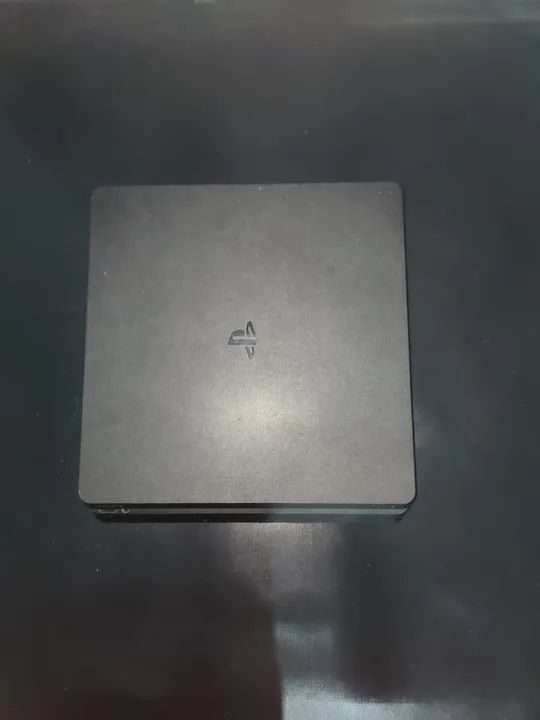 Ps4 Slim 1tb praticamente novo tudo original.