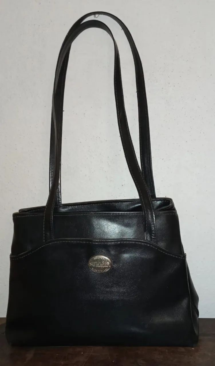Bolsas elegantes de couro 