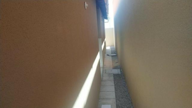 Casa com 2 quartos, 2 banheiros, varanda, sala de estar. - Foto 16