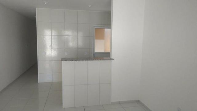 Casa com 2 quartos, 2 banheiros, varanda, sala de estar. - Foto 12