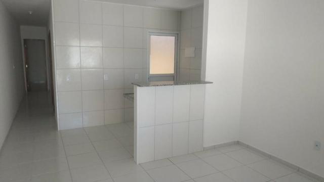 Casa com 2 quartos, 2 banheiros, varanda, sala de estar. - Foto 8