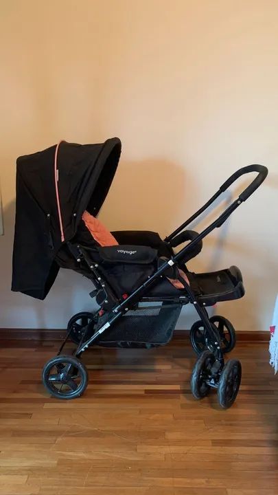 Carrinho de Bebê Reversível Voyage Rosa e Preto - Foto 5