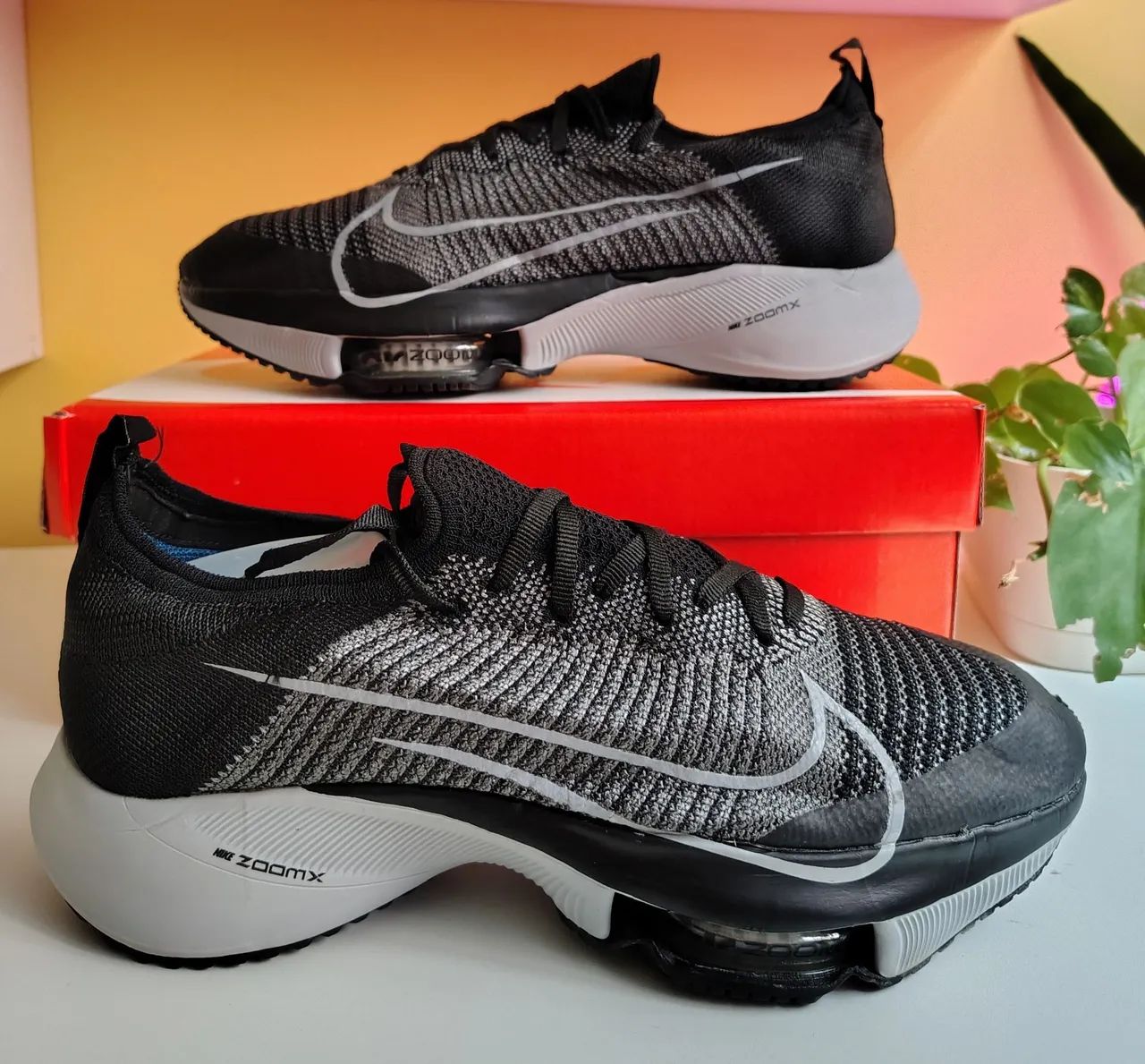 Tênis Nike Air zoom tempo next %