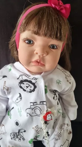 Boneca Bebê Reborn Real Roupinha Pagão Lilas Acompanha Bolsa
