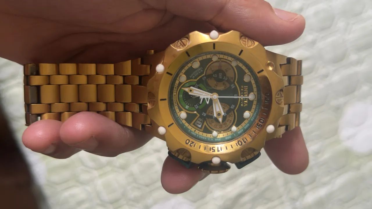 relógio invicta dourado 
