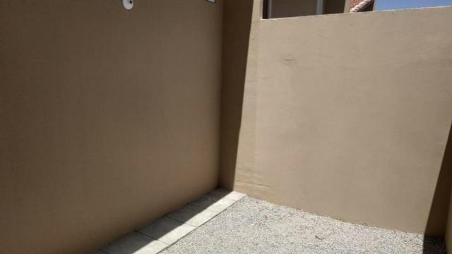 Casa com 2 quartos, 2 banheiros, varanda, sala de estar. - Foto 9