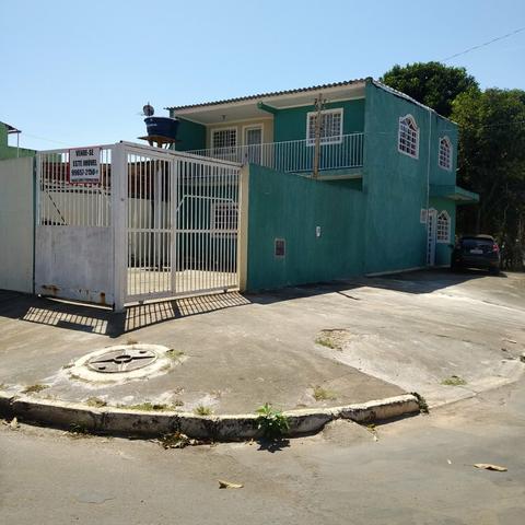 Casa com excelente espaço / bem localizada - Foto 4
