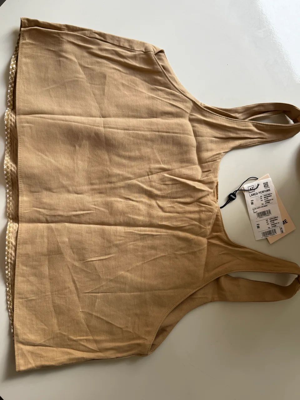Blusa lança perfume bege M  - Foto 4