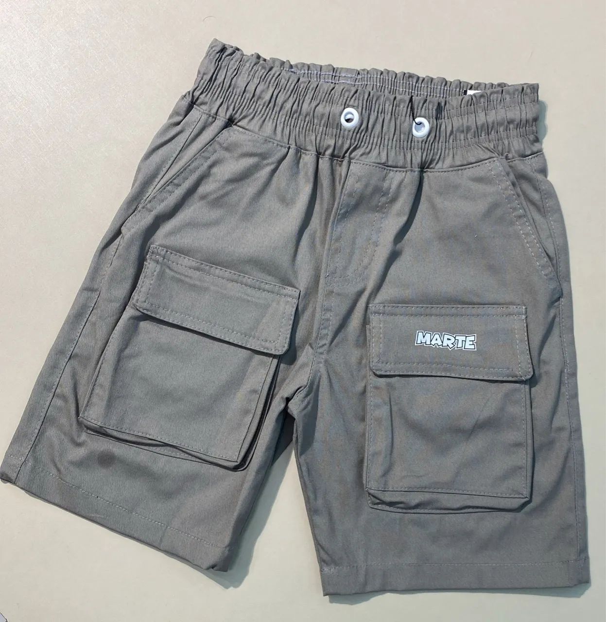 ? bermuda Marte surf infantil ?