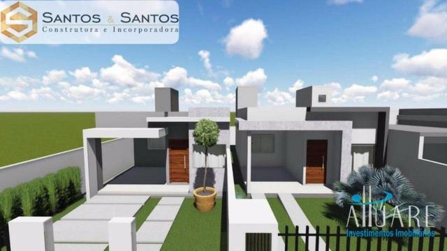Linda casa com jardim e passagem lateral.CA0138